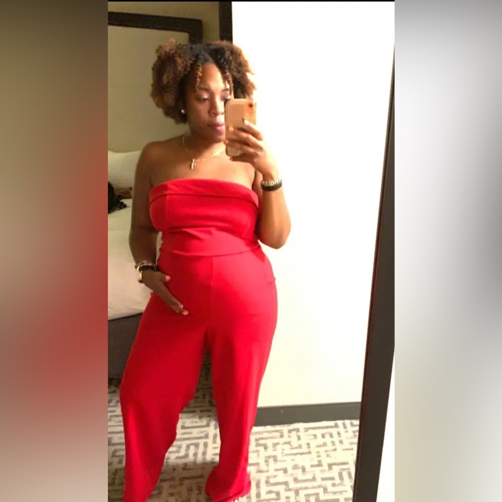✨All red strapless sexy jumpsuit✨! Polyester blend, size L & only worn once